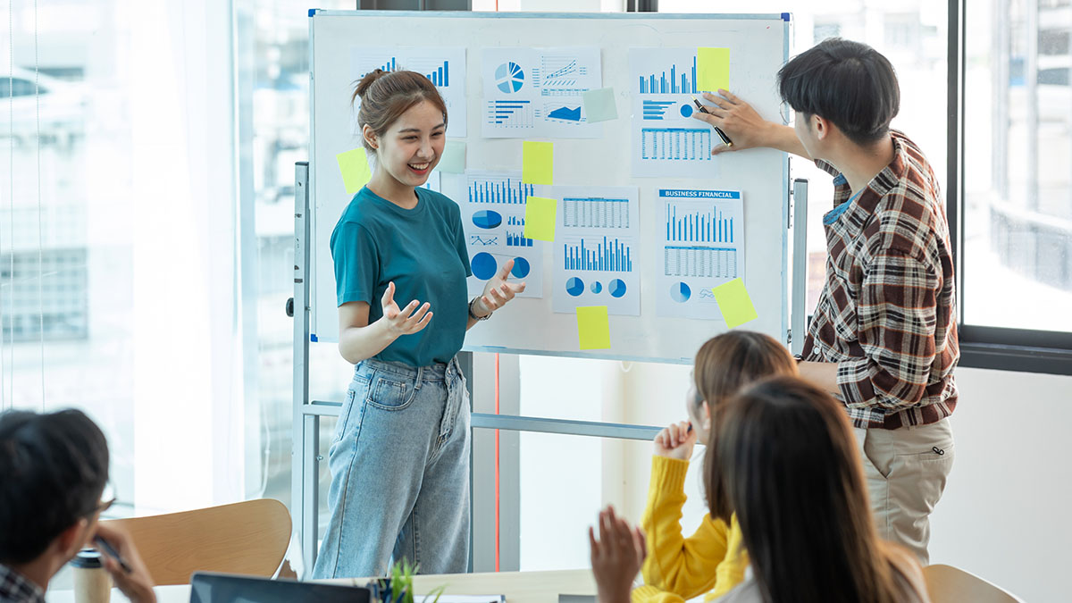 Students using whiteboard 