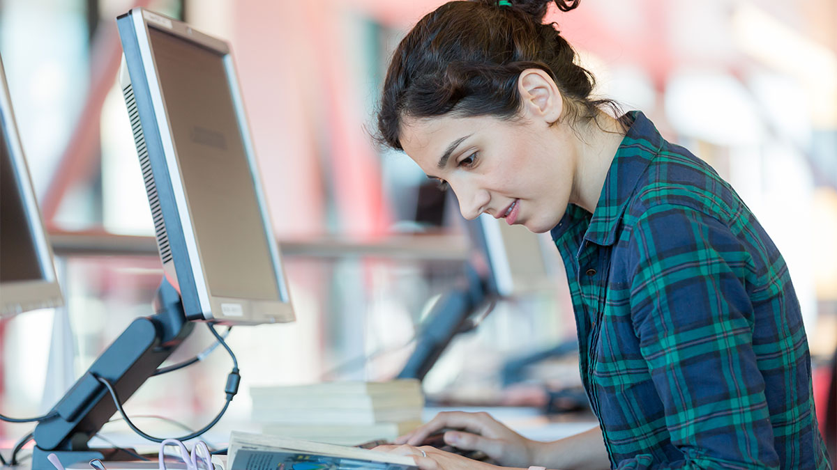 Student at Library Computer